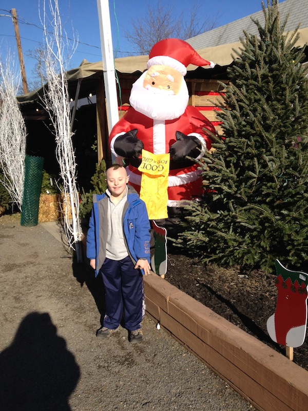 Wordless Wednesday - Cj With Inflatable Santa While Christmas Tree Shopping